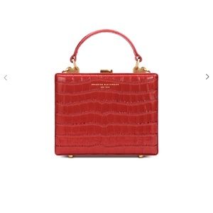 Brandon Blackwood croc embossed trunk